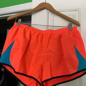 NIKE NEON ORANGE RUNNING SHORTS